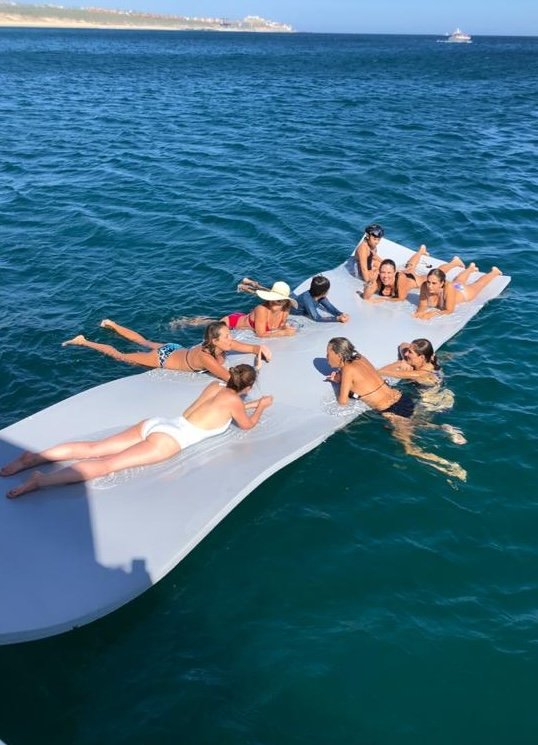 Pelican X guests enjoying the floating mat